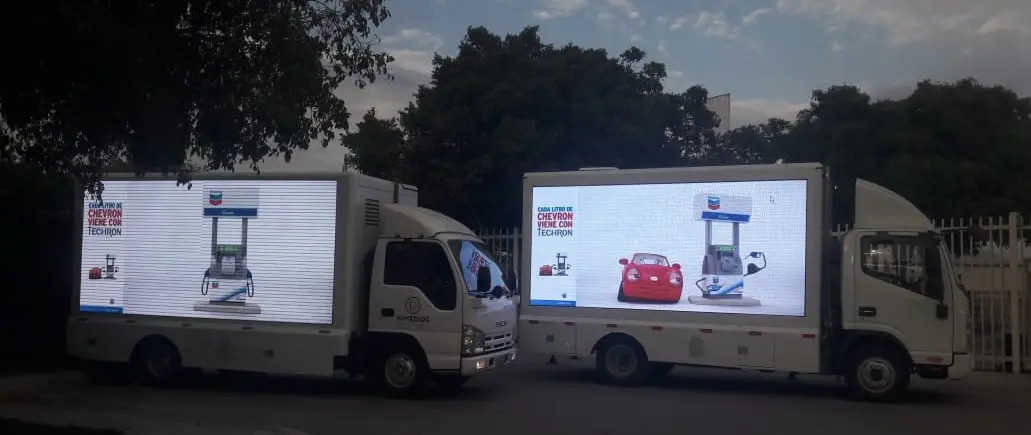 Two VIMEDIOS mobile LED trucks operating at the same time